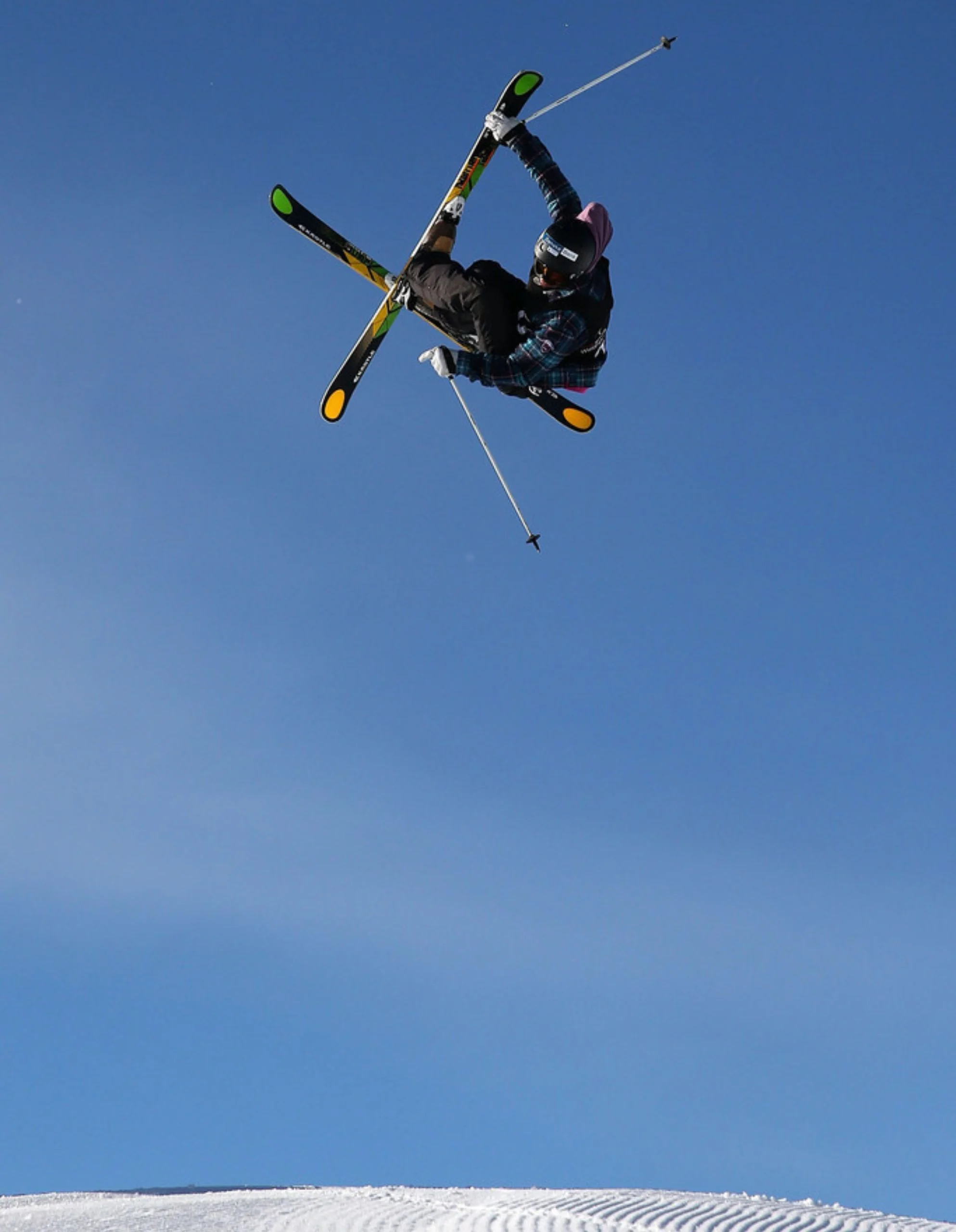Eetu skiing, in the air mid-jump